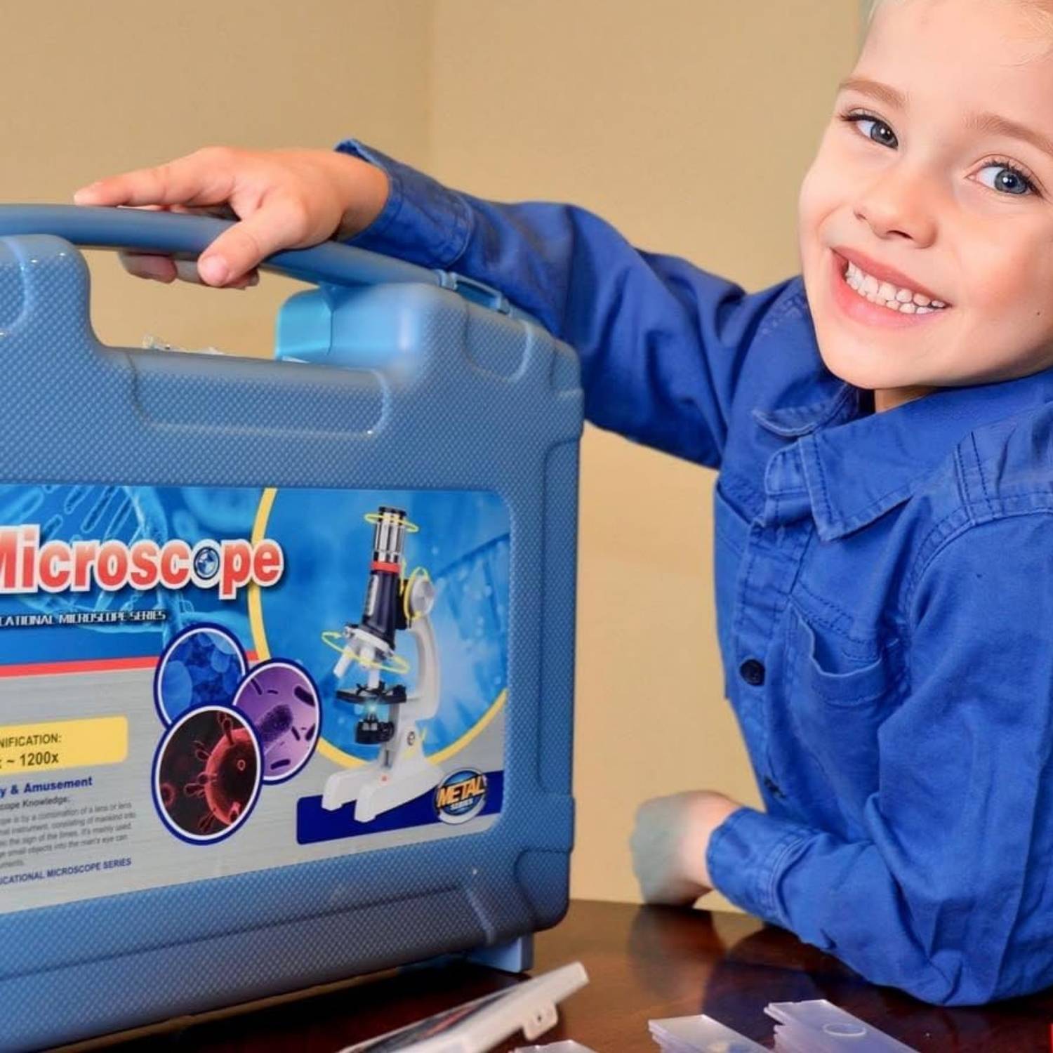 A metal-bodied children's microscope with slides